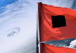 Hurricane warning flag with satellite image of a hurricane in the background
