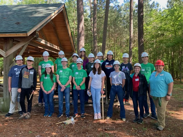 Participants of the 2022 Spring 4-H Forestry contest including youth from Wilson, Forsyth, Edgecombe, and Alamance counties. On the far right are NCSU Extension Forestry intern, Savannah Jones, and NC 4-H contest holder and Extension Forestry Environmental Educator, Renee Strnad.